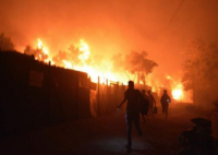 希腊最大难民营发生大火 具体起火原因是什么?