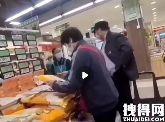 武汉一超市内悬挂大米储备任务牌 究竟是怎么回事？